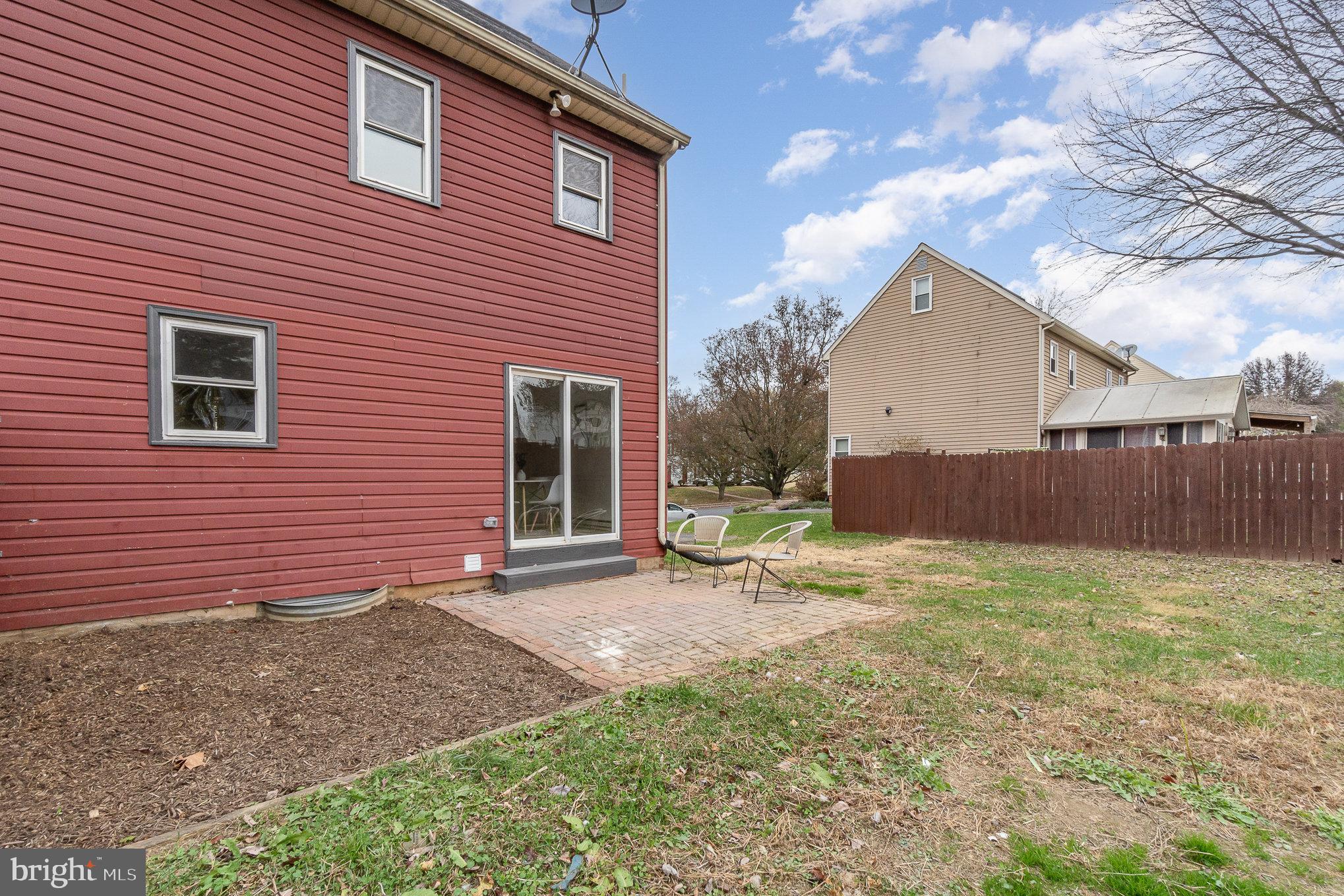 1638 Chadwick Circle Lancaster, PA 17603 - Photo 24 of 25 a view of a house with backyard and a tree