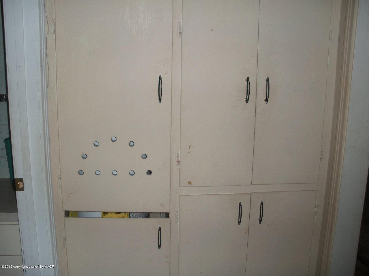 4618 Crockett Street Amarillo, TX 79110 - Photo 6 of 18 linen closet w/water heater closet