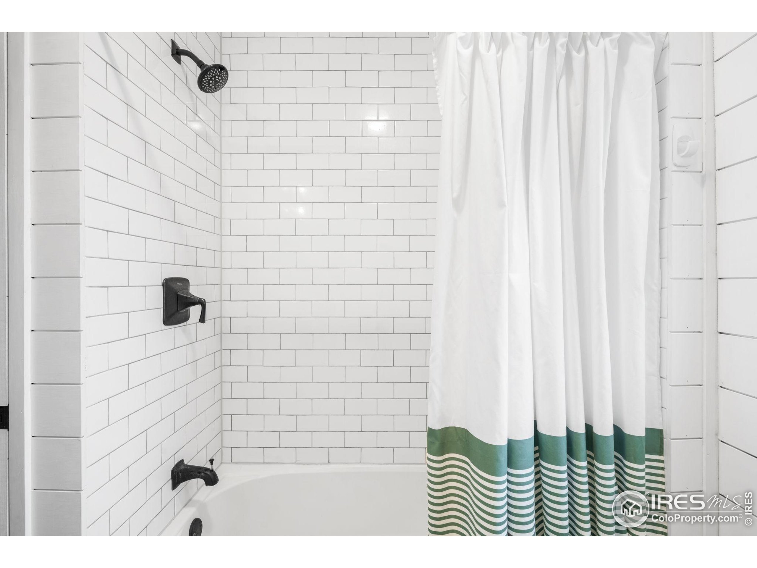 3359 Steele Street Denver, CO 80205 - Photo 18 of 48 a bathroom with a shower