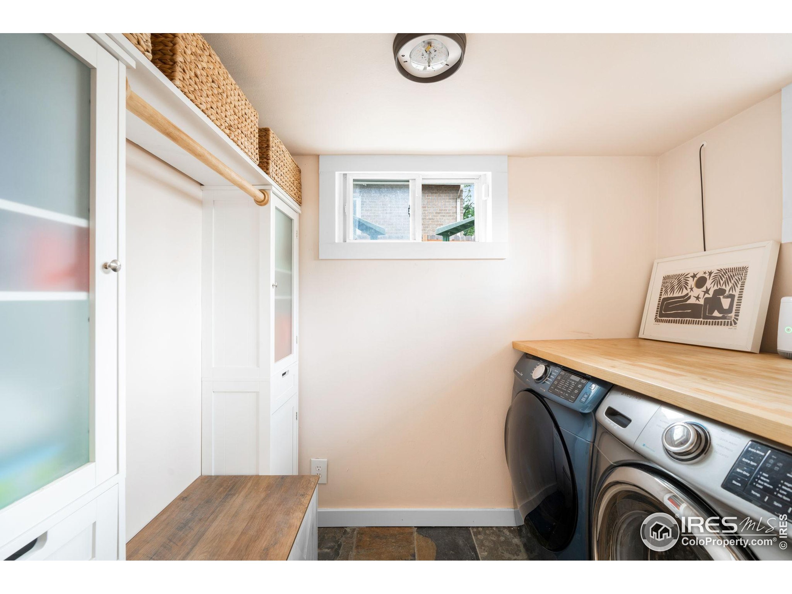 3359 Steele Street Denver, CO 80205 - Photo 27 of 48 a utility room with dryer and washer