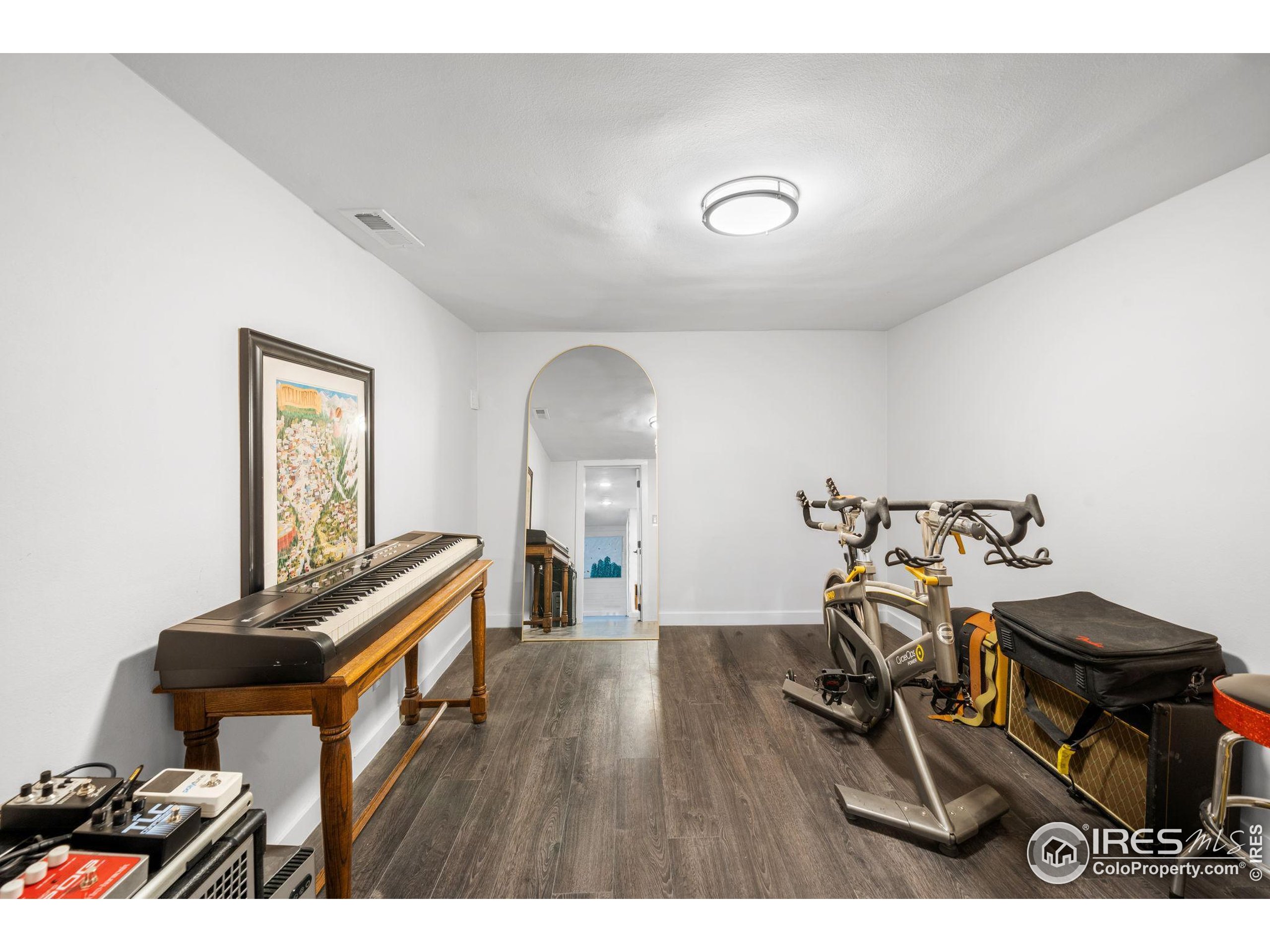 3359 Steele Street Denver, CO 80205 - Photo 28 of 48 a view of a room with gym equipment