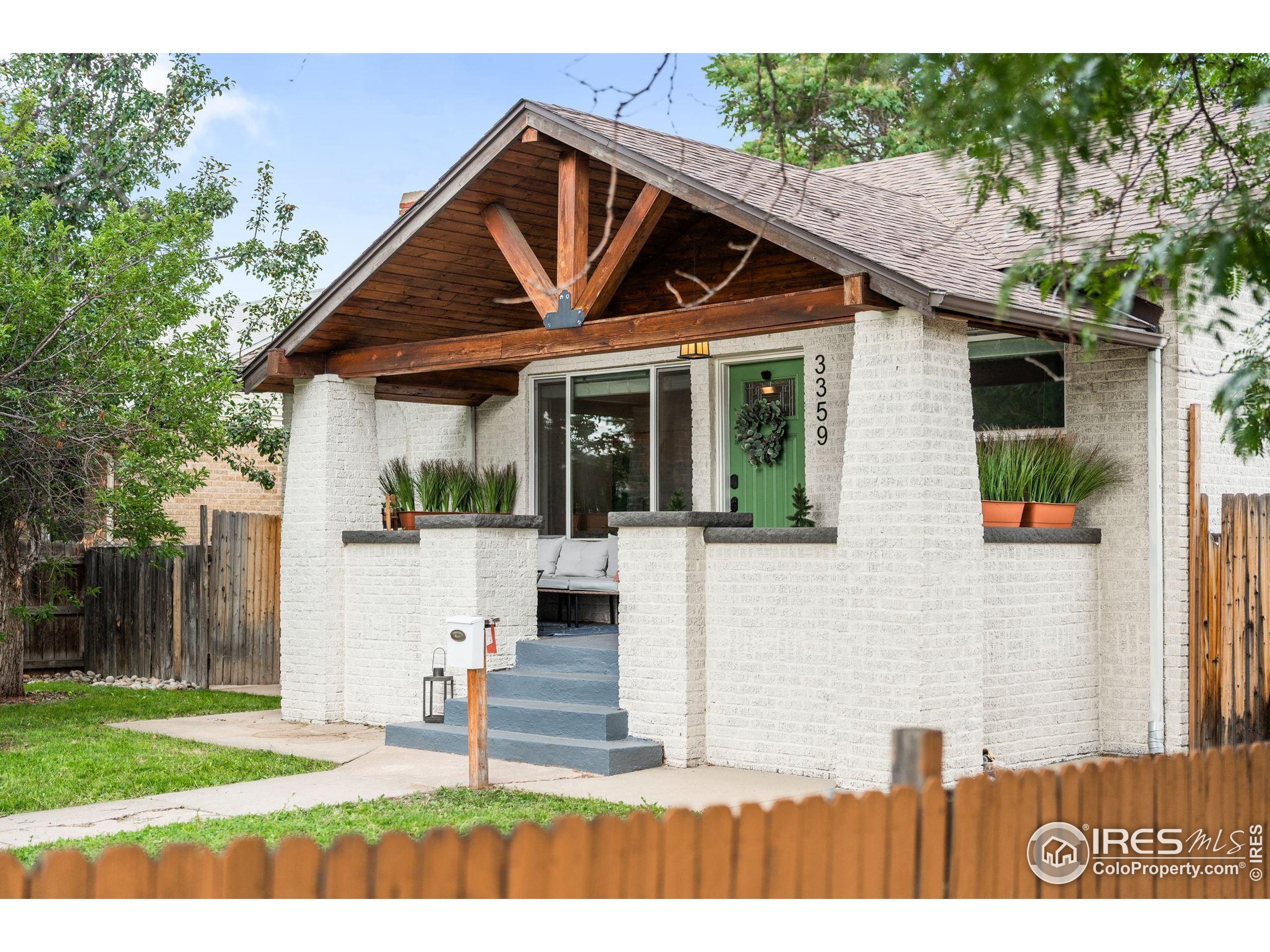 3359 Steele Street Denver, CO 80205 - Photo 29 of 48 a view of small yard in front of house