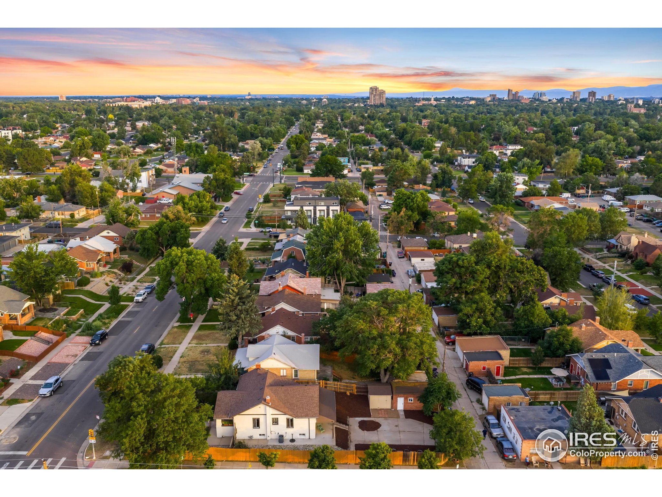 3359 Steele Street Denver, CO 80205 - Photo 45 of 48 an aerial view of residential houses with outdoor space
