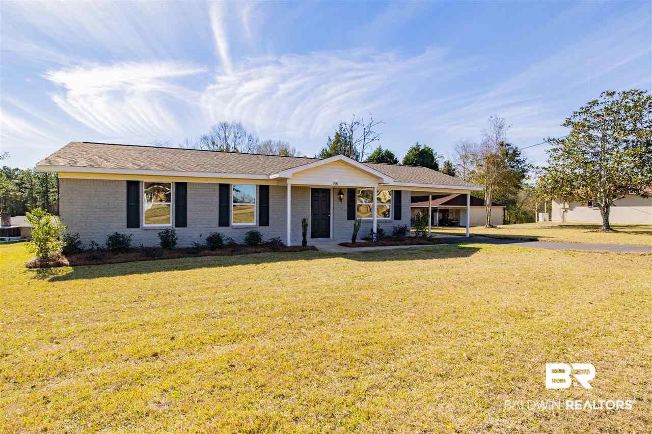 9141 Semmes Court Semmes, AL 36575 - Photo 24 of 28 New Carrier HVAC system and storm shutters.