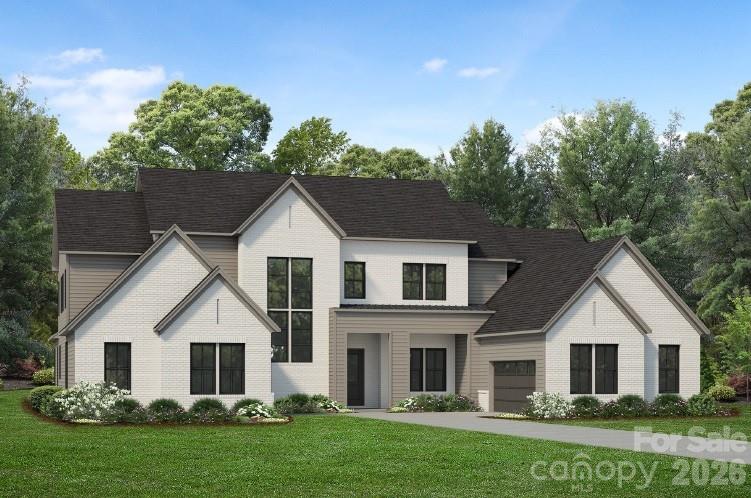 1007 Cox Road, Unit 15 Weddington, NC 28104 - Photo 1 of 1 front view of a house with a yard