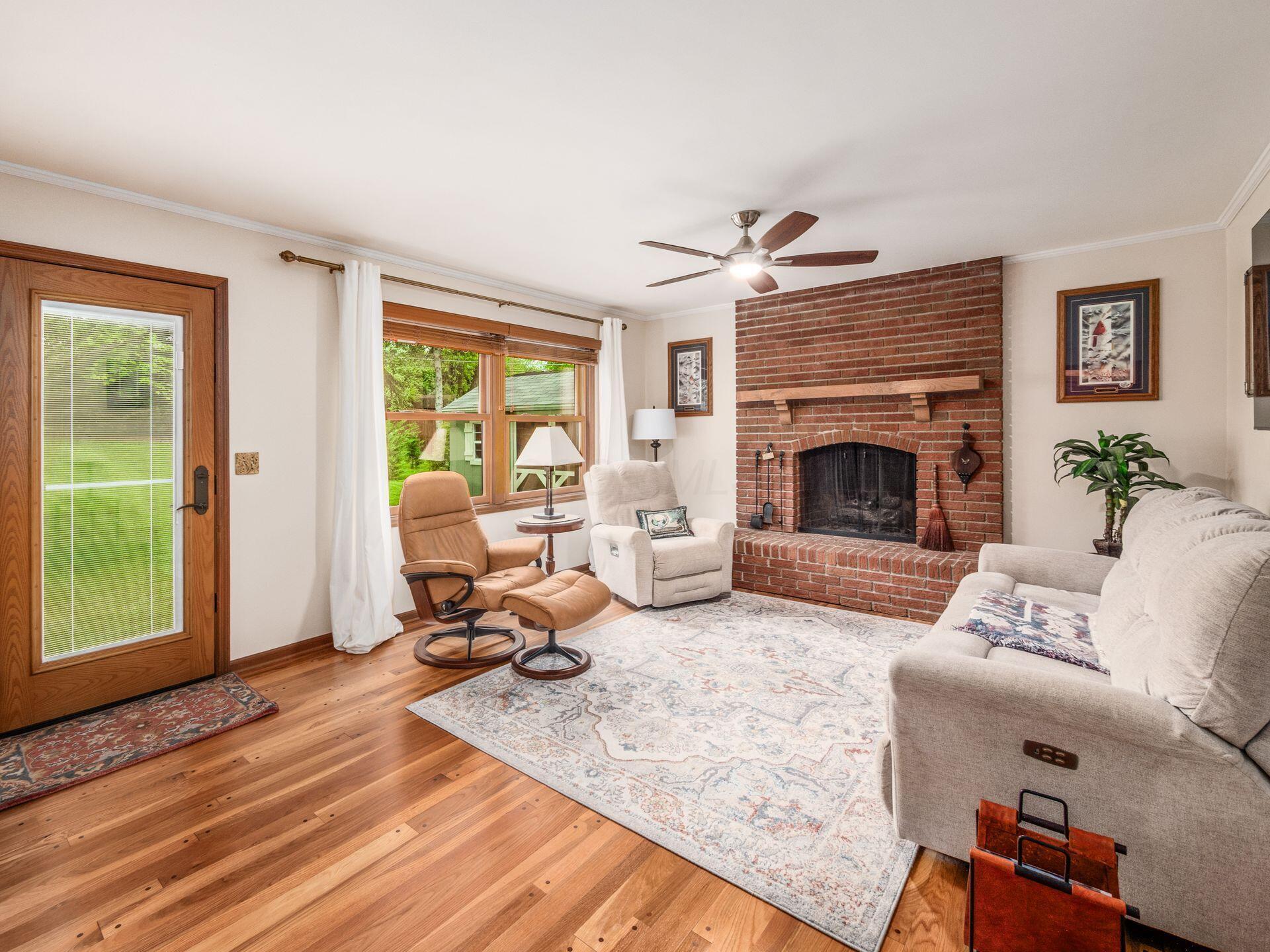 4159 Rowanne Road Columbus, OH 43214 - Photo 9 of 47 Family room with woodburning fireplace