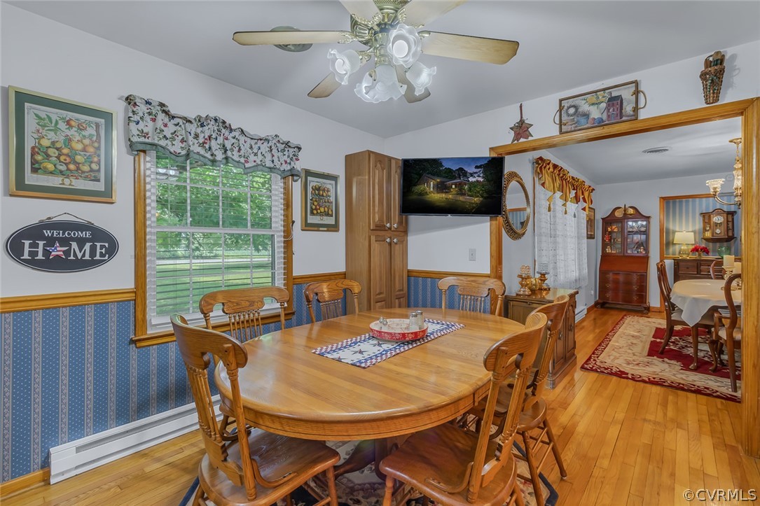 31 Bunker Hill Road Farnham, VA 22460 - Photo 21 of 47 a view of a dining room with furniture window and wooden floor