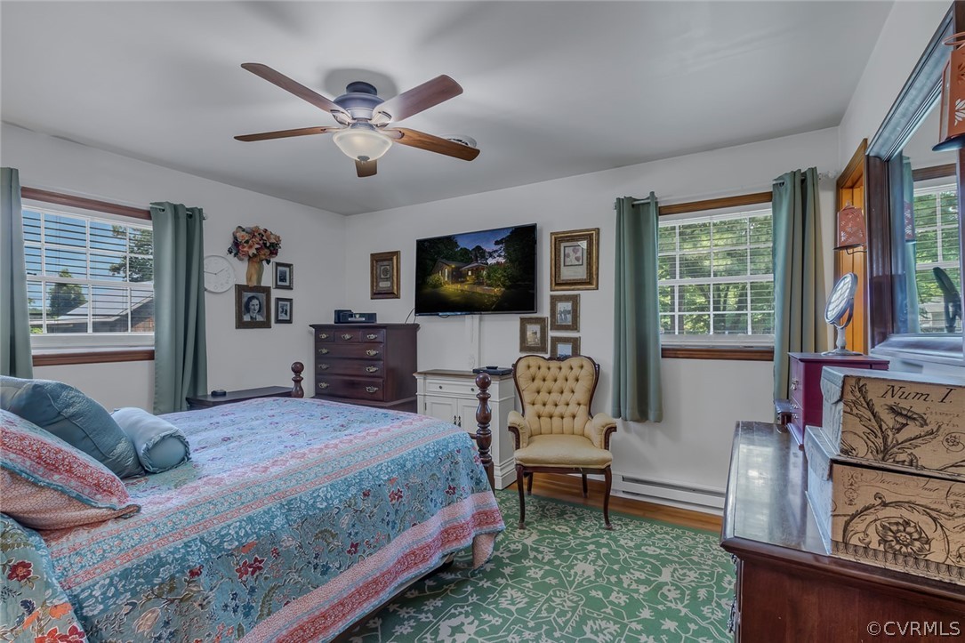 31 Bunker Hill Road Farnham, VA 22460 - Photo 24 of 47 a bedroom with a bed and a flat screen tv