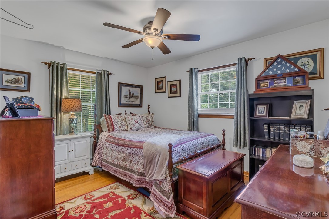 31 Bunker Hill Road Farnham, VA 22460 - Photo 28 of 47 a bedroom with a bed and wooden floor