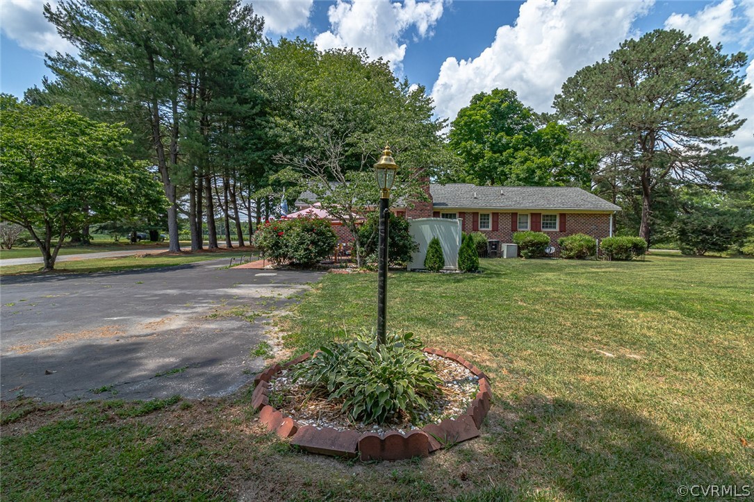 31 Bunker Hill Road Farnham, VA 22460 - Photo 40 of 47 a house view with a garden space