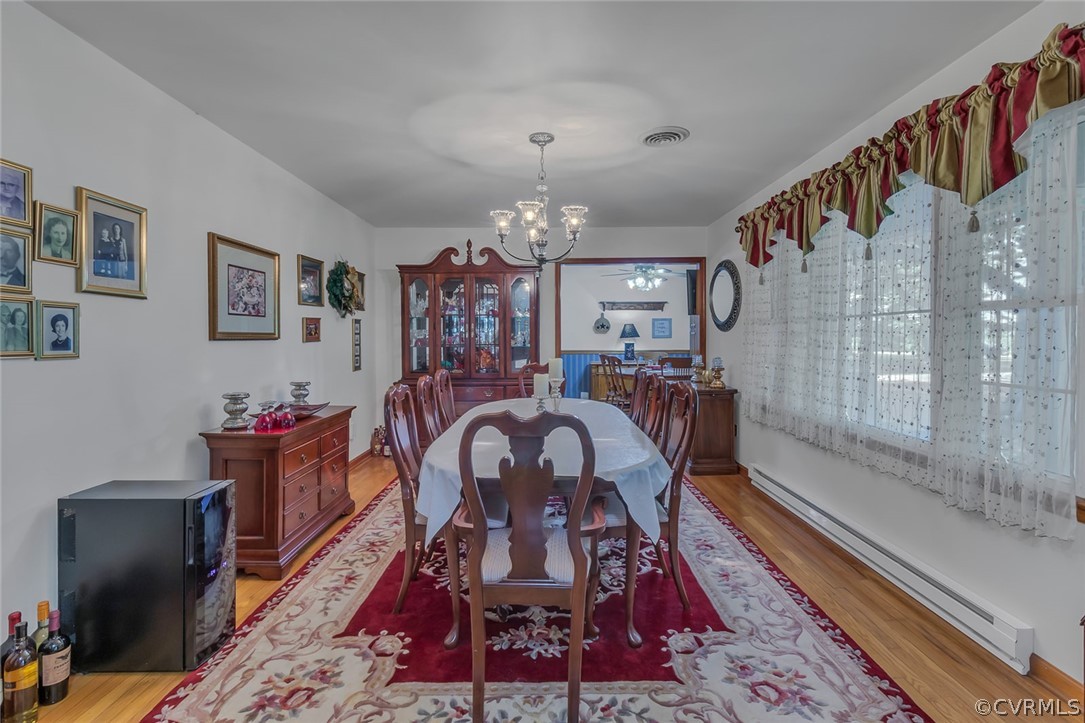 31 Bunker Hill Road Farnham, VA 22460 - Photo 8 of 47 a view of a dining room with furniture window and wooden floor