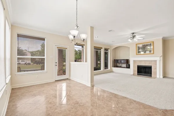 a view of empty room with windows