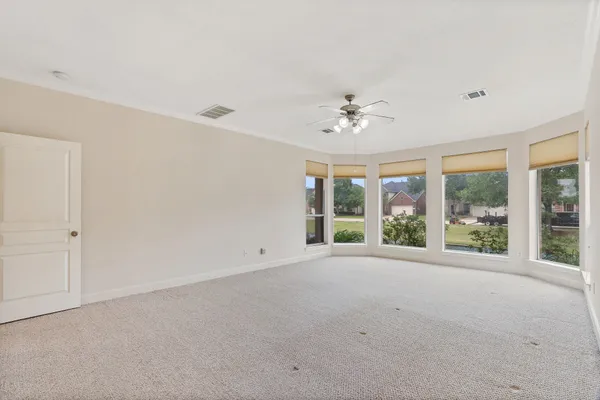 a balcony with wooden floor