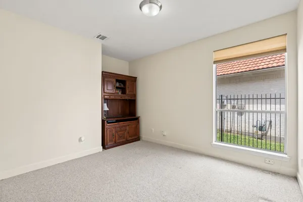 a view of small space with racks on the wall