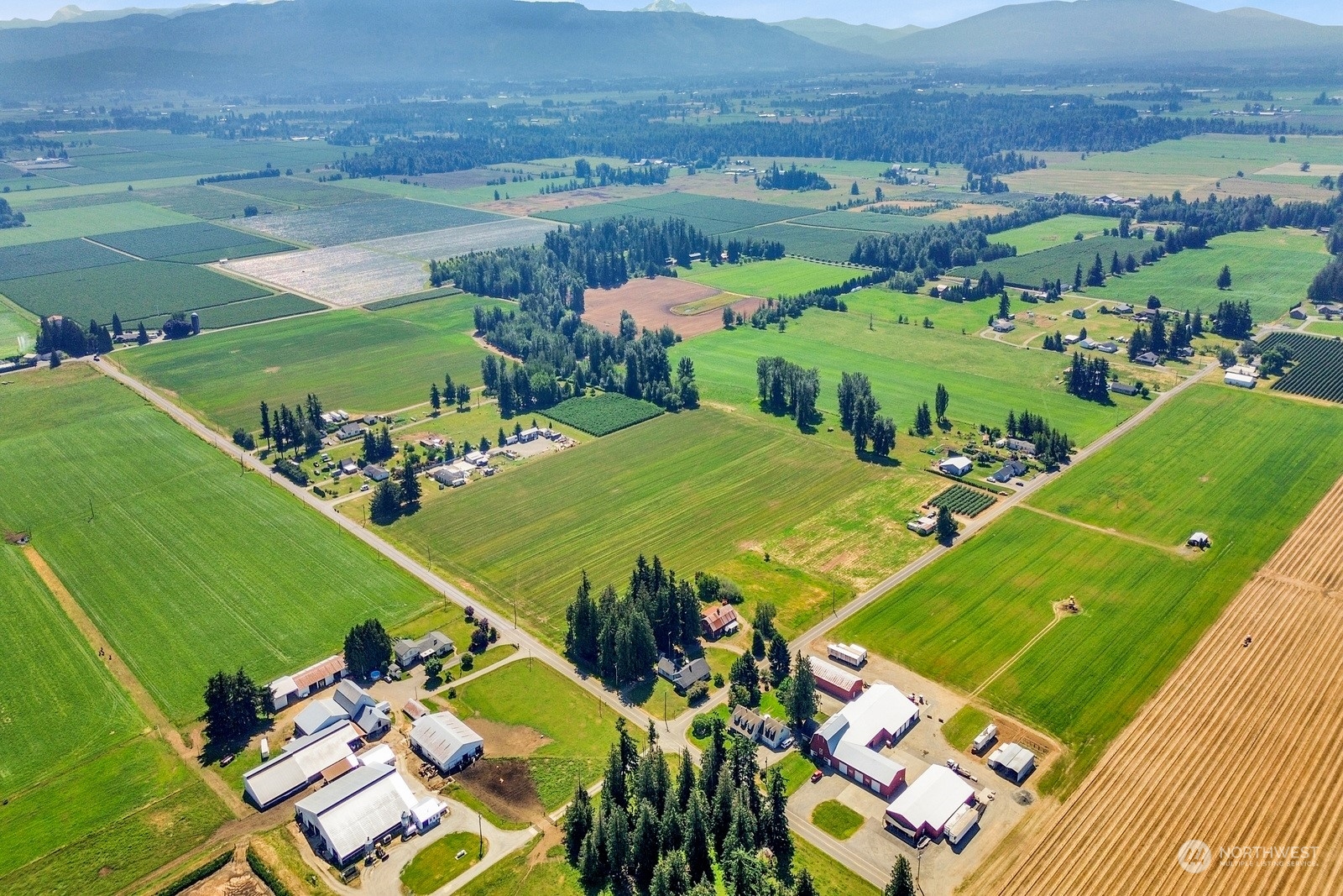 1705 Pangborn Road Lynden, WA 98264 - Photo 40 of 40 an aerial view of a pool yard and mountain view in back