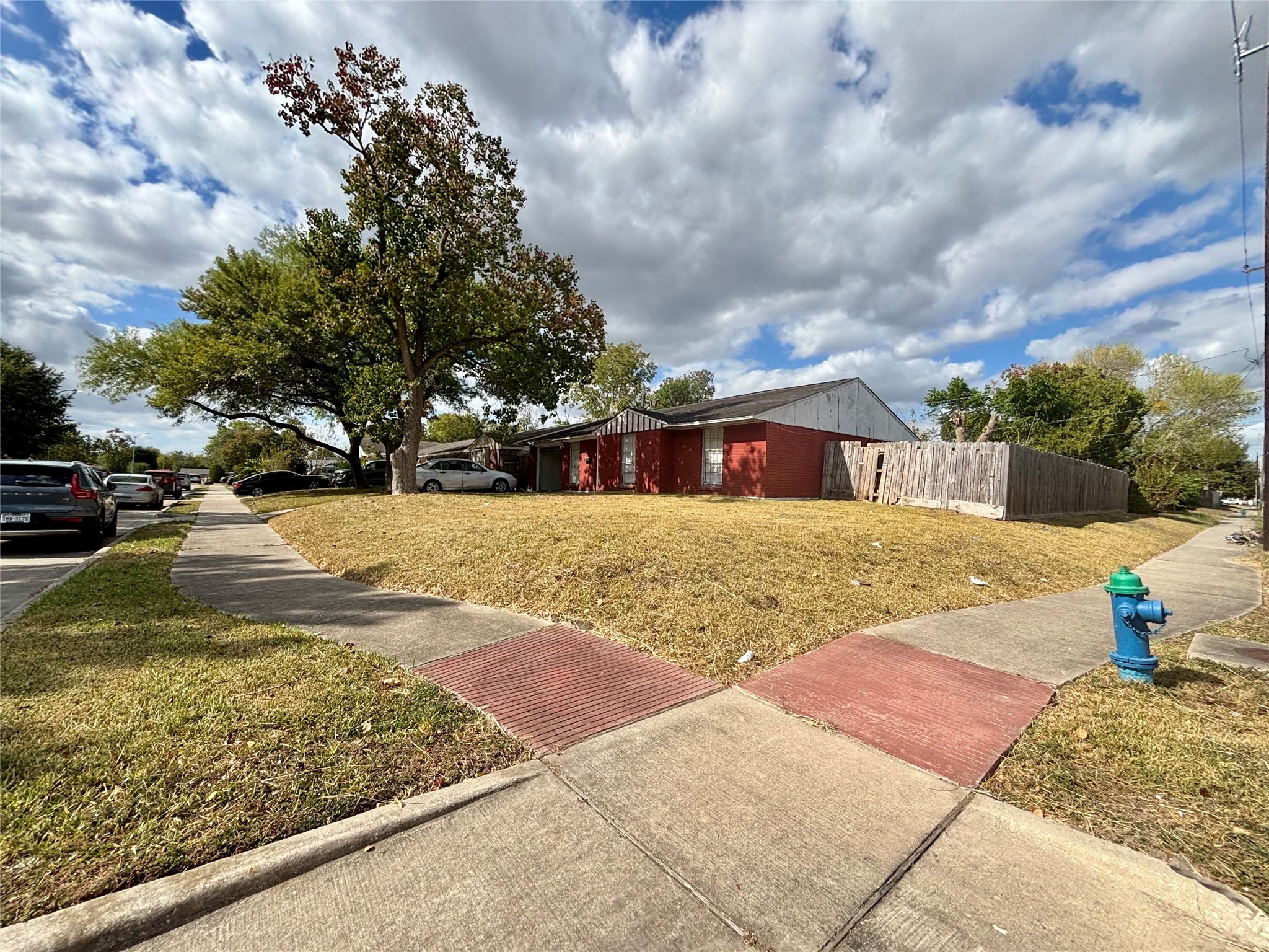 3902 Heatherbloom Drive Houston, TX 77045 - Photo 12 of 22 a view of a yard with cars