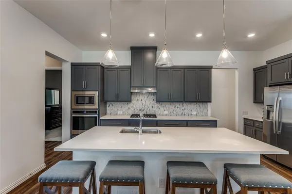 a view of a dining room with furniture