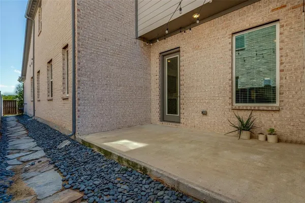 a view of a backyard of a house