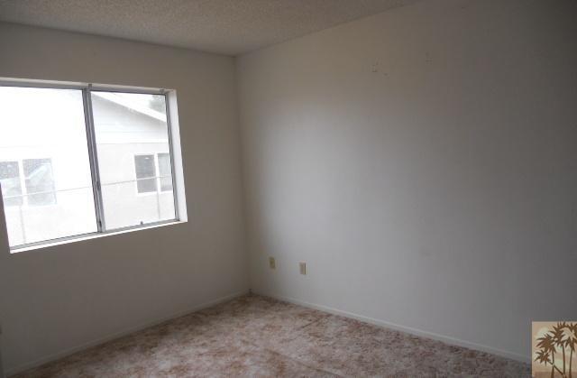 6117 Panorama Road Joshua Tree, CA 92252 - Photo 6 of 6 an empty room with a window