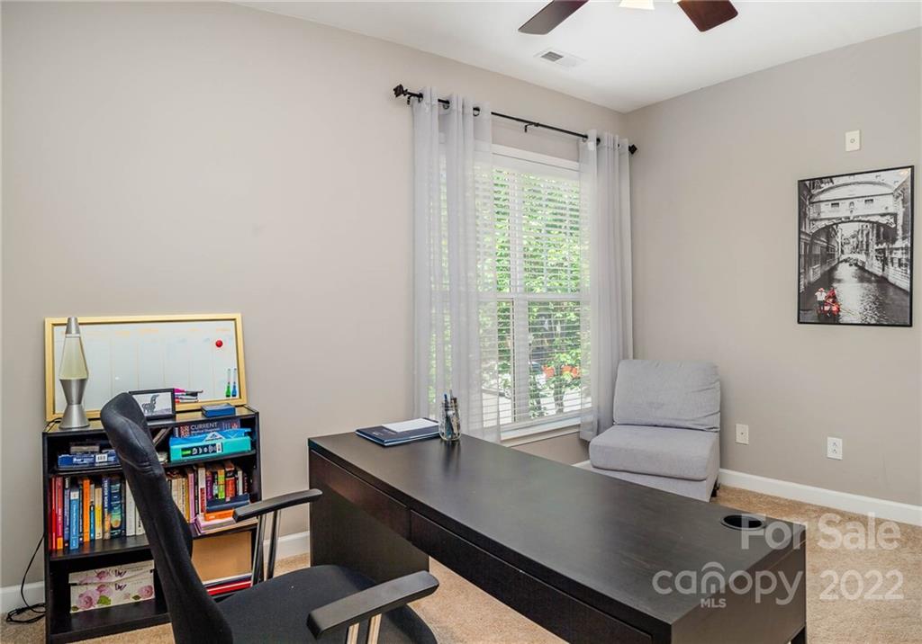 4156 Walker Road Charlotte, NC 28211 - Photo 18 of 24 a view of a workspace with furniture and a window