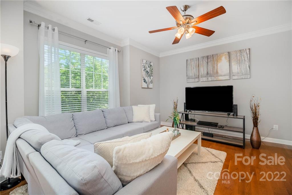4156 Walker Road Charlotte, NC 28211 - Photo 3 of 24 a living room with furniture and a flat screen tv