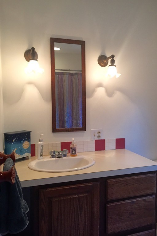1325 Bay Road Amherst, MA 01002 - Photo 19 of 30 a bathroom with a sink and a mirror
