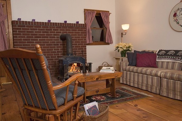 1325 Bay Road Amherst, MA 01002 - Photo 4 of 30 a view of a balcony with chairs