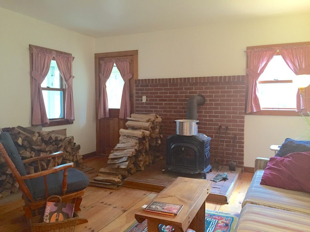 1325 Bay Road Amherst, MA 01002 - Photo 5 of 30 a living room with furniture and a window