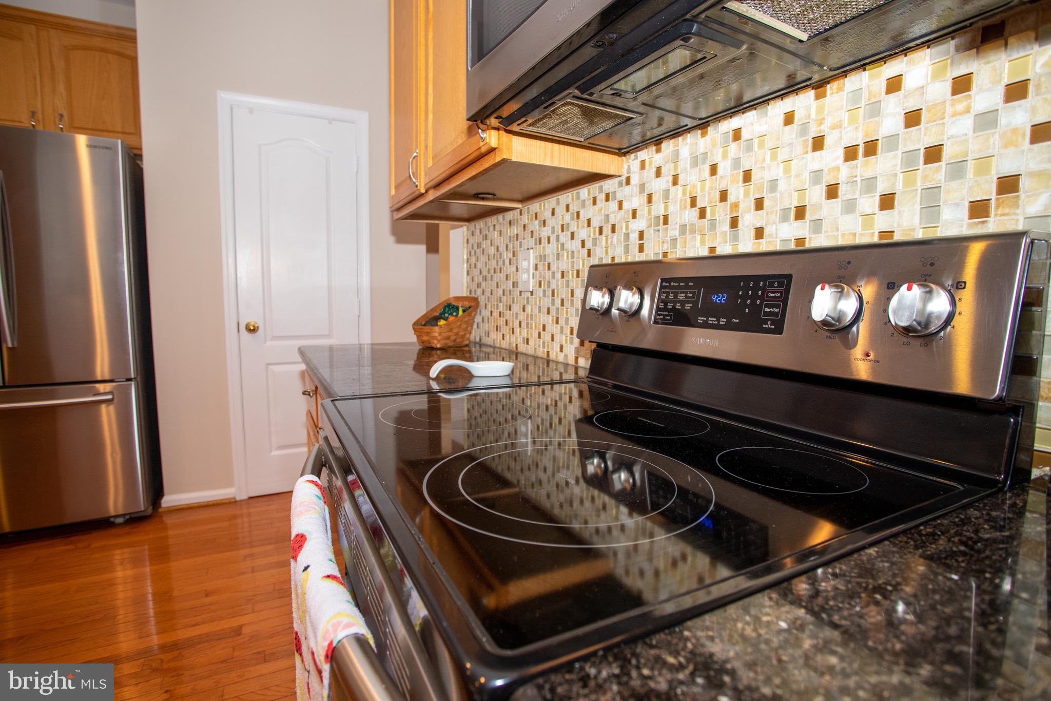17911 Coachmans Road Germantown, MD 20874 - Photo 44 of 86 electric cooktop