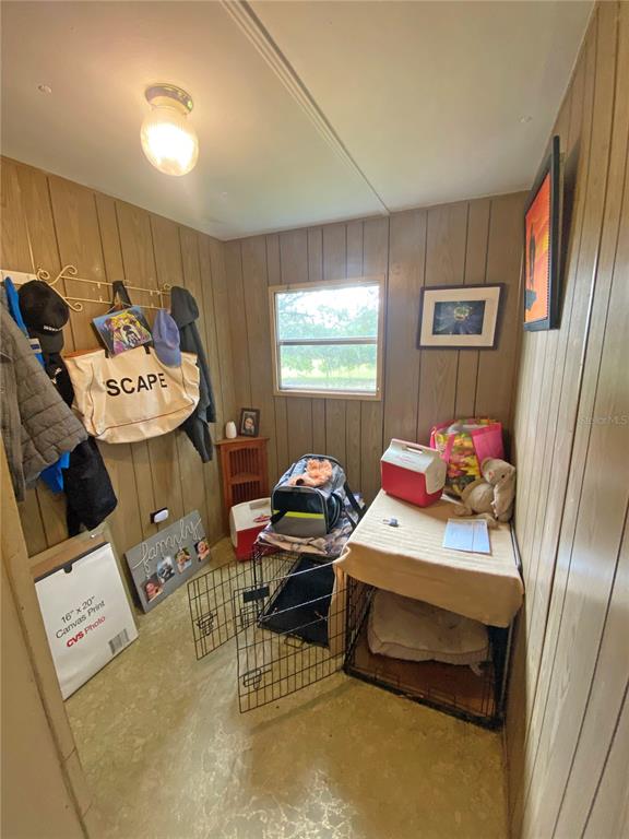 148 Swan Lake Road Melrose, FL 32666 - Photo 18 of 30 a bedroom with furniture and a bed