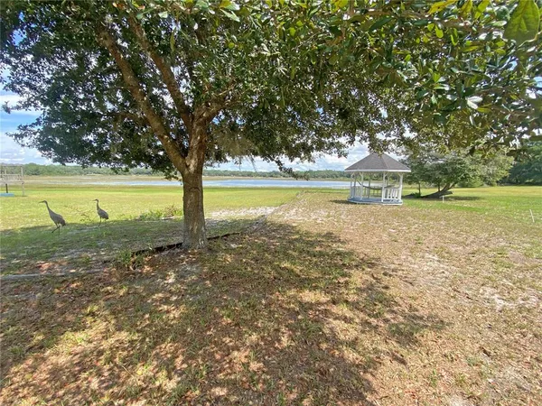 a view of an ocean with a big yard