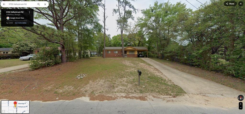 5755 Valleybrook Road Columbus, GA 31907 - Photo 1 of 1 a view of a backyard with trees