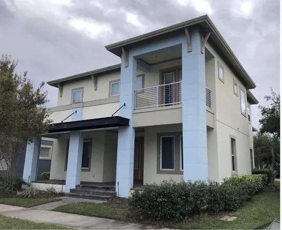 a front view of a house with yard