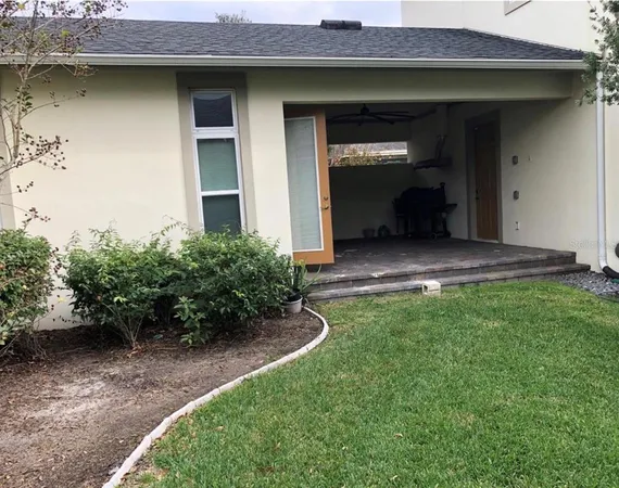 a house view with a backyard space