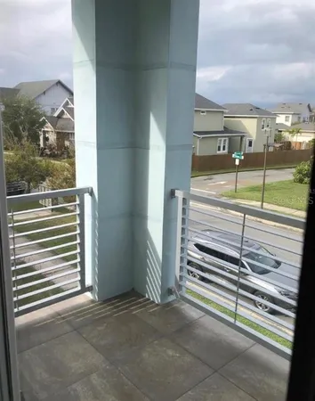 a view of a balcony with an outdoor space