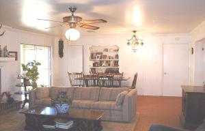 6024 Ward Street Amarillo, TX 79110 - Photo 4 of 5 a living room with furniture and chandelier