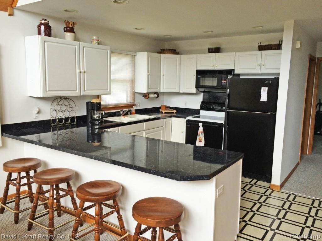 4023 Port Austin Road Caseville, MI 48725 - Photo 7 of 18 4023PtAustinKitchen.jpg