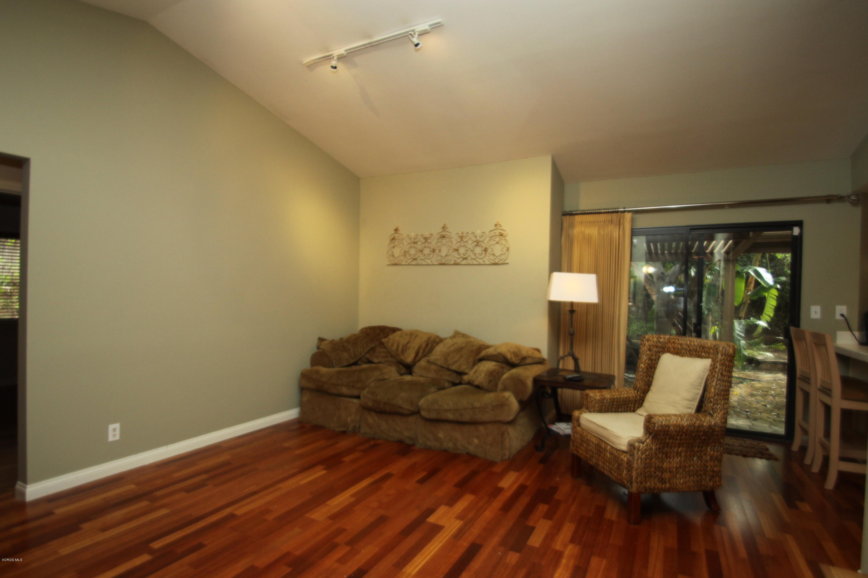 13638 Bear Valley Road Moorpark, CA 93021 - Photo 9 of 18 a living room with furniture and wooden floor