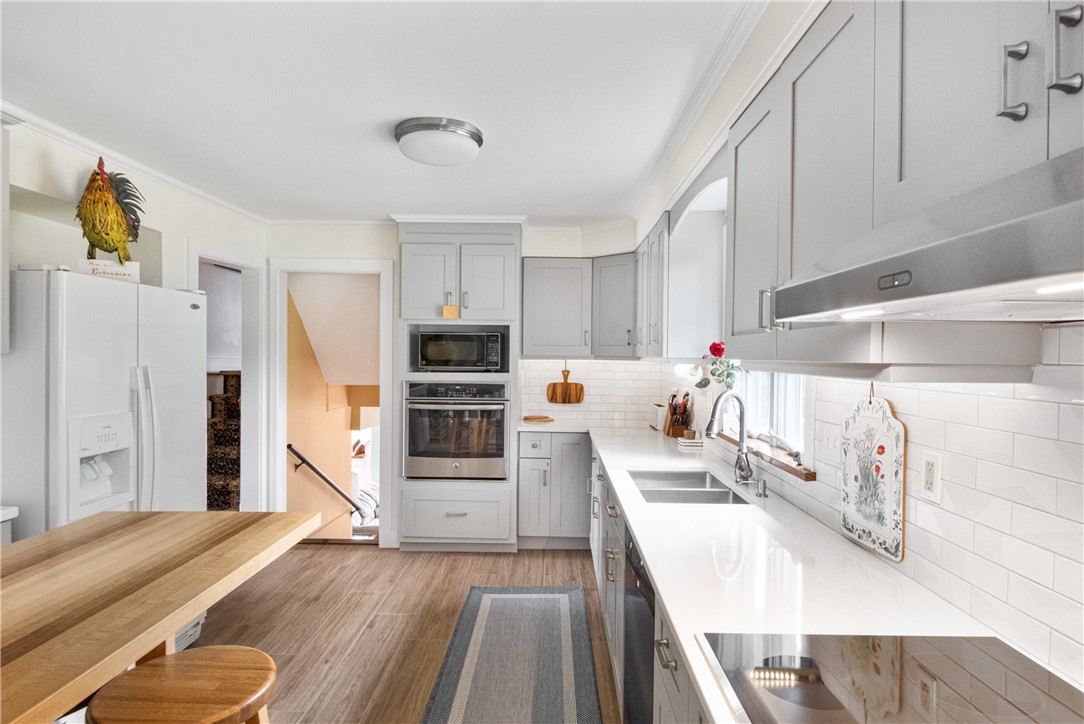 16 Circle Drive Middletown, RI 02842 - Photo 19 of 40 This shows the short stairways of 5 and 8 steps that lead to the 1st and 3rd levels of the house.