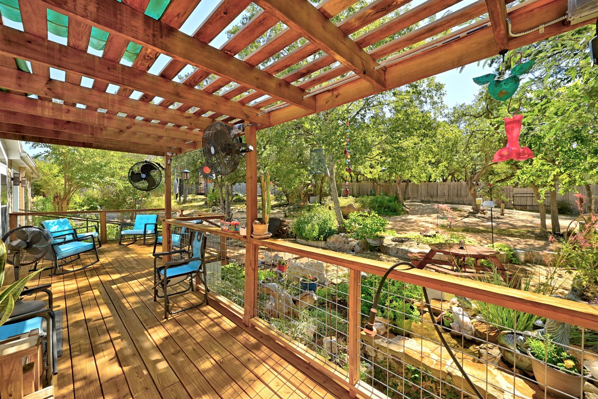 120 Cedar Bend Road Wimberley, TX 78676 - Photo 10 of 40 a view of a patio with wooden floor