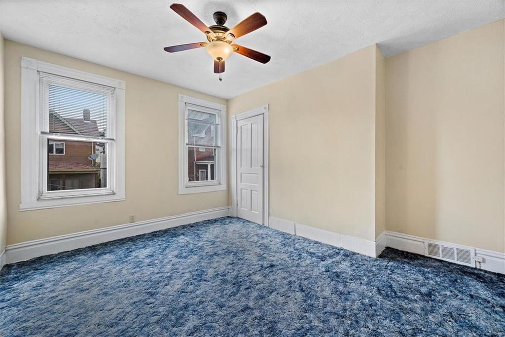 915 1st Street McKees Rocks, PA 15136 - Photo 23 of 25 a view of an empty room with a window
