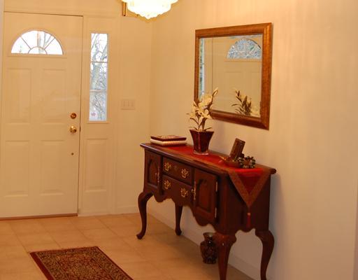 Other. THE ENTRY IS A GRACIOUS SIZE AND WELCOMES YOU INTO THIS MODERN CUSTOM BUILT HOME