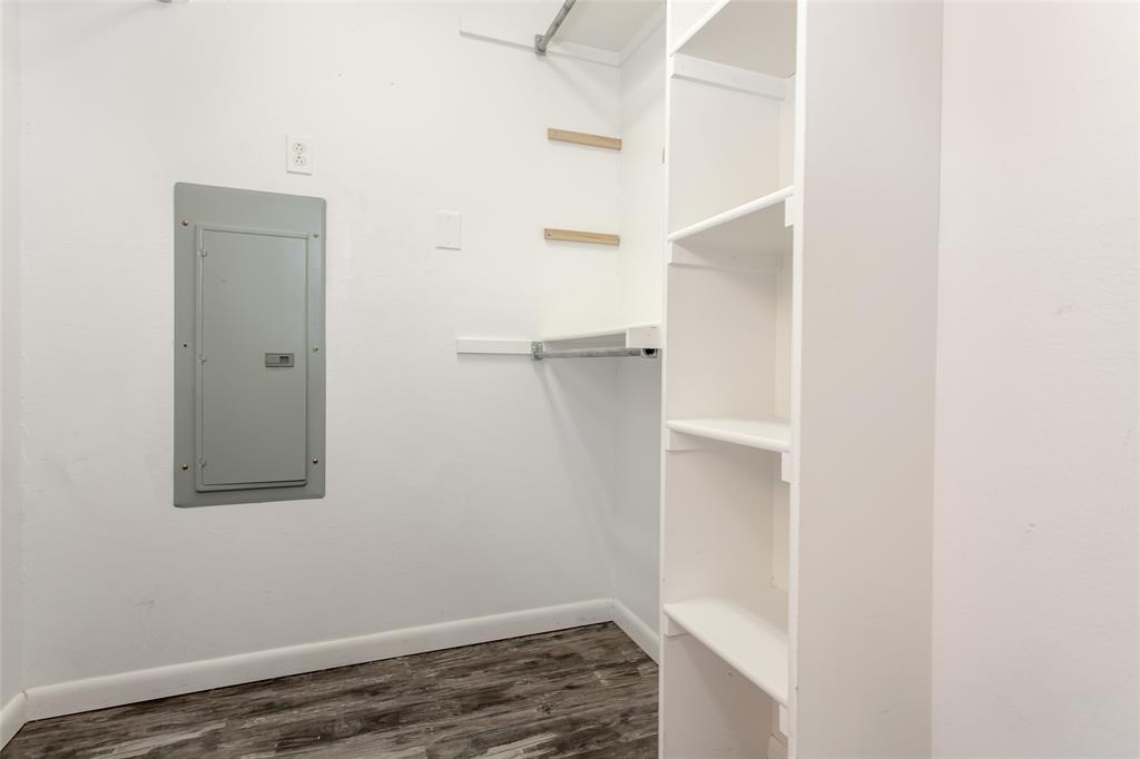 712 Billups Street Van Alstyne, TX 75495 - Photo 25 of 38 a view of an empty walk in closet