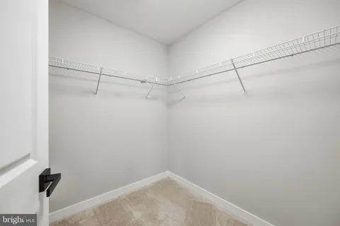 a view of small space with racks on the wall