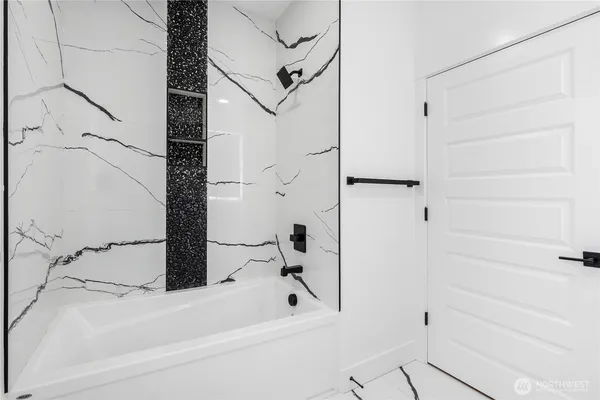 a black and white photo of a living room