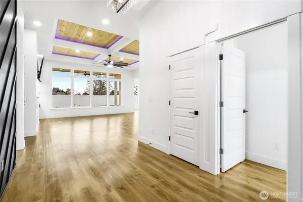 a view of a kitchen and an entryway