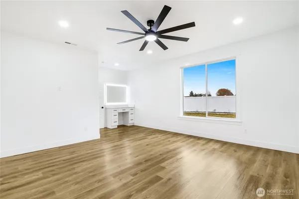a bathroom with a double vanity sink mirror and double