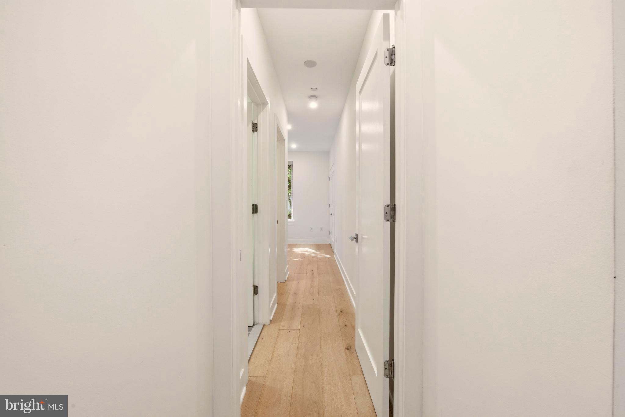1023 16th Street Northeast, Unit B Washington, DC 20002 - Photo 15 of 25 a view of a hallway with a white walls