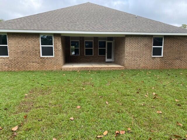 2535 Rutgers Road Crestview, FL 32536 - Photo 18 of 21 a view of a house with windows