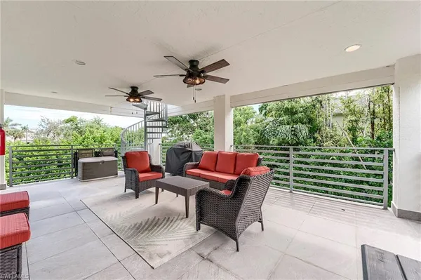 a outdoor living space with furniture and garden view
